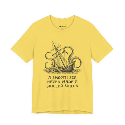 A smooth sea never made a skilled sailor — Unisex Cotton Tee