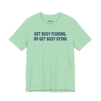 Get Busy Fishing, or Get Busy Dying — Unisex Cotton Tee
