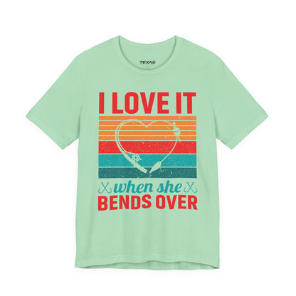 I Love It When She Bends Over — Unisex Cotton Tee