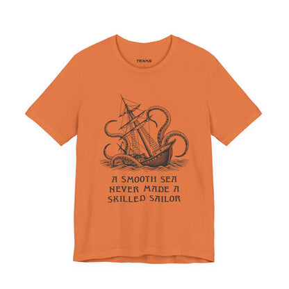 A smooth sea never made a skilled sailor — Unisex Cotton Tee