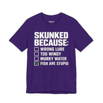 Skunked Because — Unisex Cotton Tee