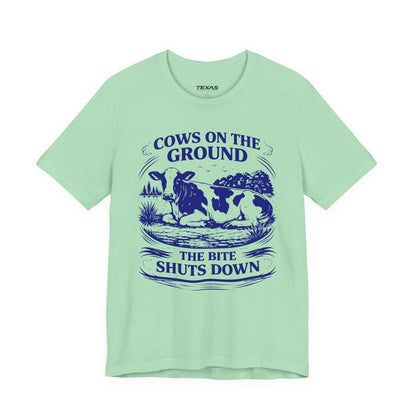 Cows on the ground, the bite shuts down — Unisex Cotton Tee