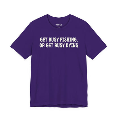 Get Busy Fishing, or Get Busy Dying — Unisex Cotton Tee