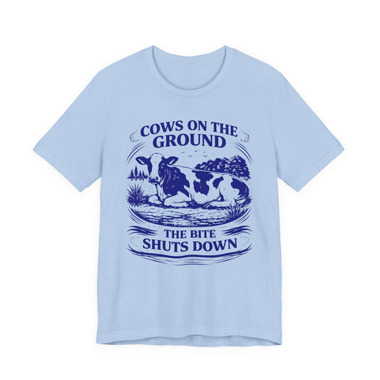 Cows on the ground, the bite shuts down — Unisex Cotton Tee