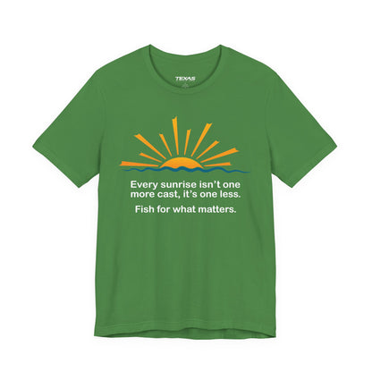 Every Sunrise Isn’t One More Cast, It’s One Less. Fish for What Matters. — Unisex Cotton Tee
