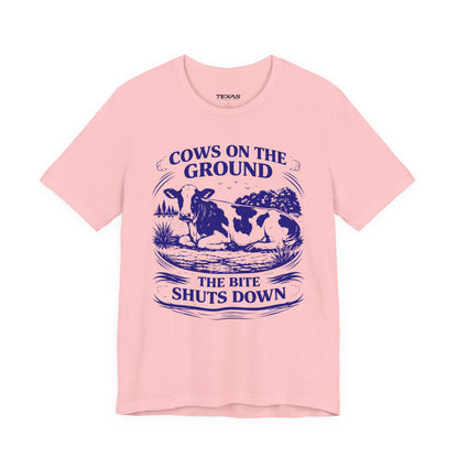 Cows on the ground, the bite shuts down — Unisex Cotton Tee