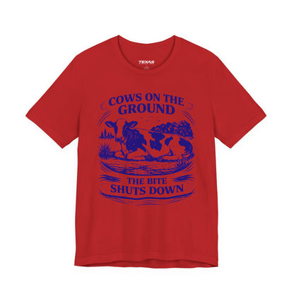 Cows on the ground, the bite shuts down — Unisex Cotton Tee