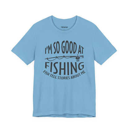 I’m So Good at Fishing, Fish Tell Stories About Me — Unisex Cotton Tee