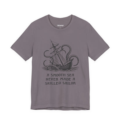 A smooth sea never made a skilled sailor — Unisex Cotton Tee