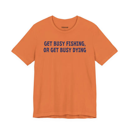 Get Busy Fishing, or Get Busy Dying — Unisex Cotton Tee