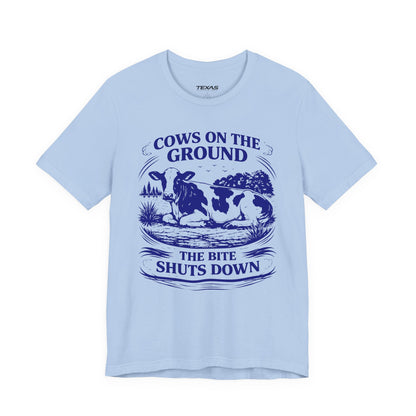 Cows on the ground, the bite shuts down — Unisex Cotton Tee